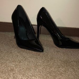 Faux Patent Leather Pumps.